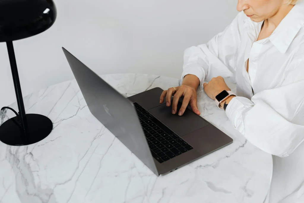 A person using a laptop.
